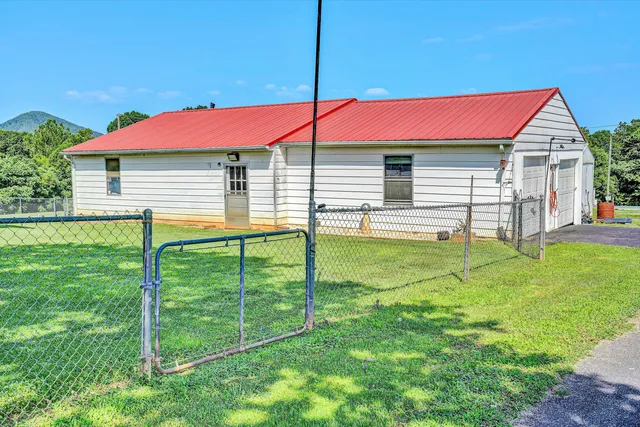 an aerial view of a house with a garden
