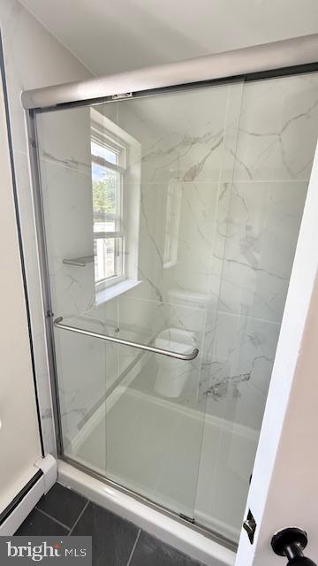 222 East Montgomery Avenue, Unit 207 Ardmore, PA 19003 - Photo 13 of 14 a bathroom with a bathtub