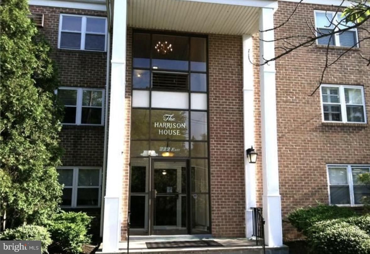 222 East Montgomery Avenue, Unit 207 Ardmore, PA 19003 - Photo 2 of 14 a view of a brick building with a large windows