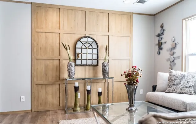 a living room with furniture and a rug