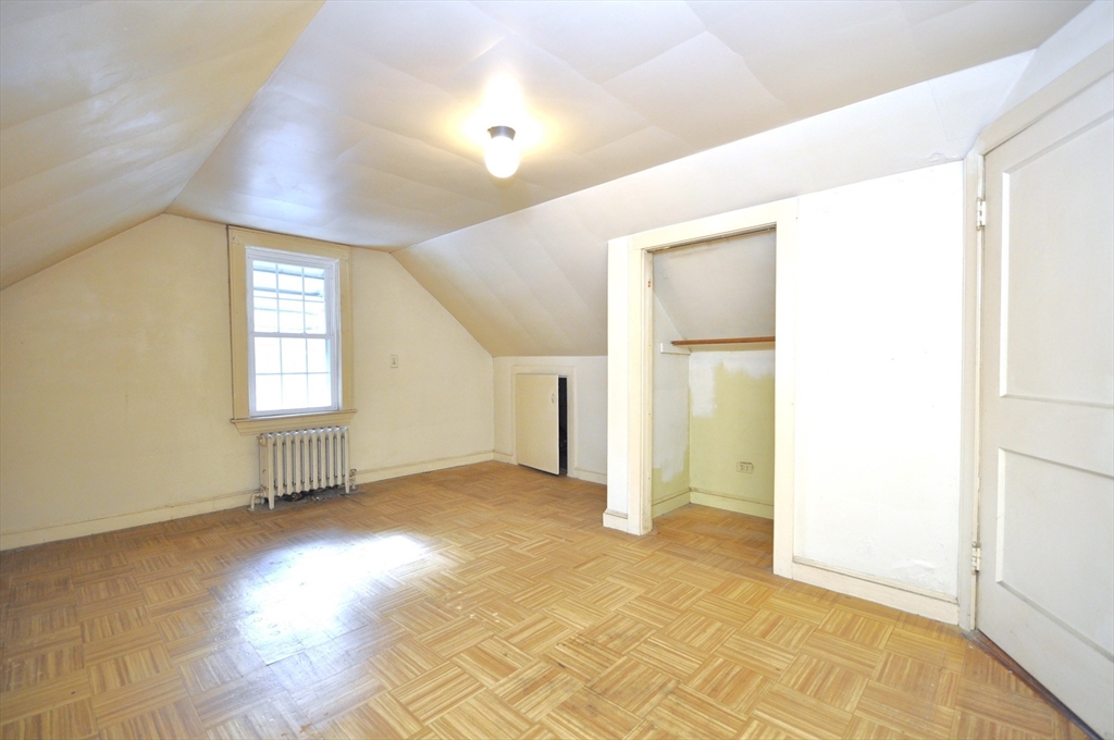34 Guild Road Brockton, MA 02302 - Photo 16 of 22 an empty room with windows and closet