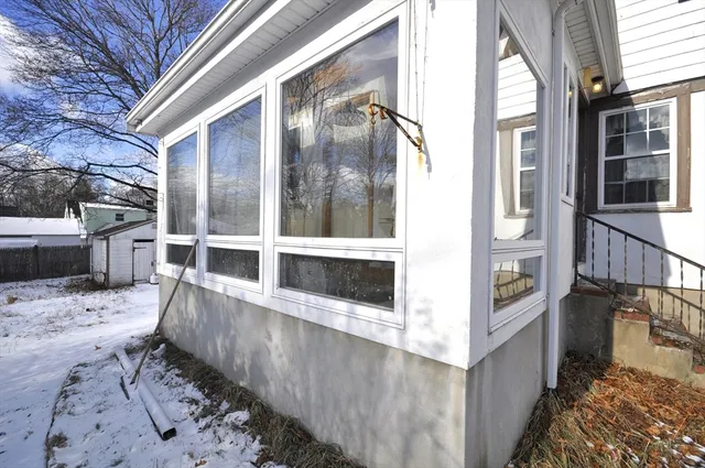a view of snow on the side of road