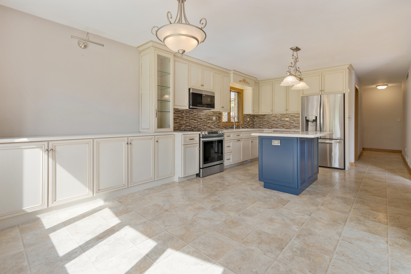 12929 Smith Road Manhattan, IL 60442 - Photo 15 of 41 a view of a kitchen with a sink and a kitchen view
