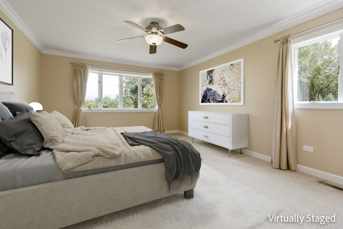 12929 Smith Road Manhattan, IL 60442 - Photo 16 of 41 a bedroom with a bed and a painting on the wall