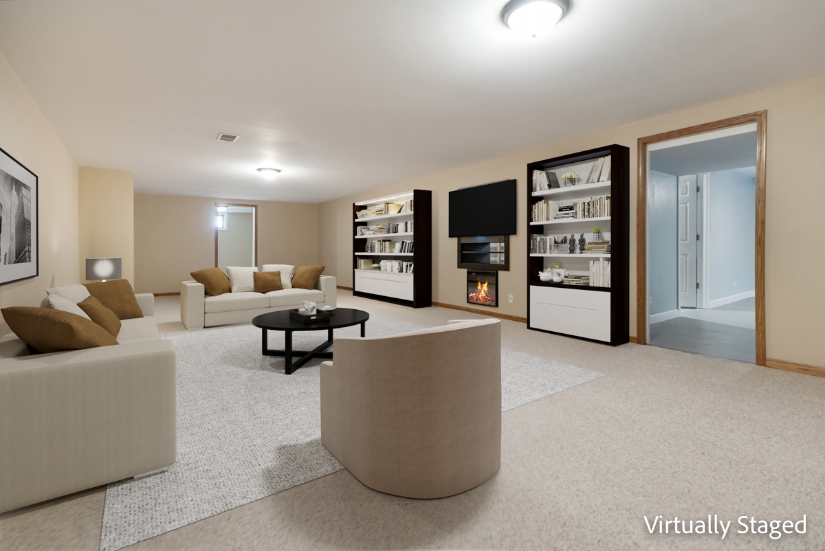 12929 Smith Road Manhattan, IL 60442 - Photo 25 of 41 a living room with furniture and a wall painting