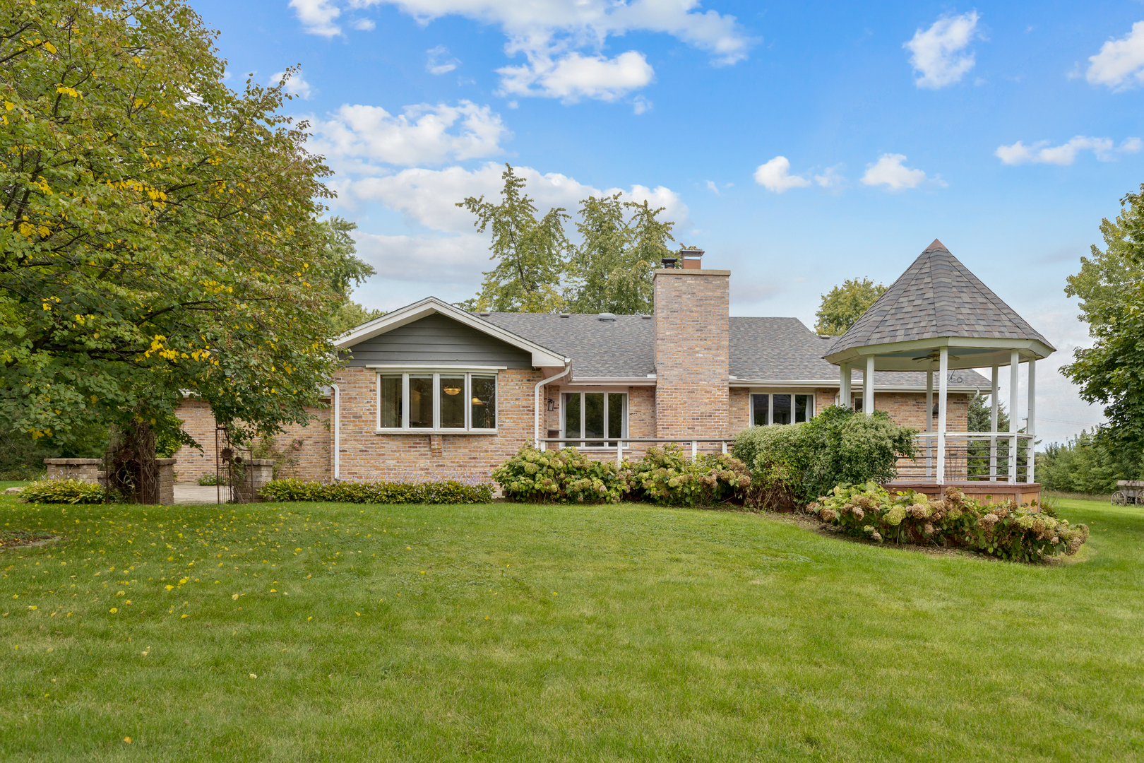 12929 Smith Road Manhattan, IL 60442 - Photo 34 of 41 a front view of house with yard and green space