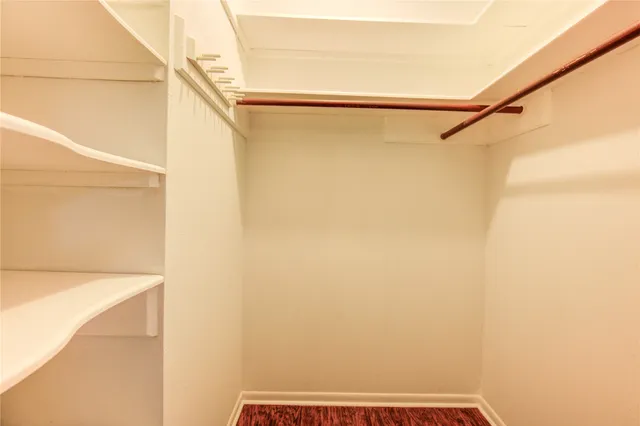 a view of a house with a yard and garden