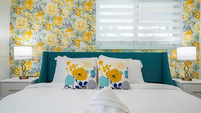 a front view of a house with a large window