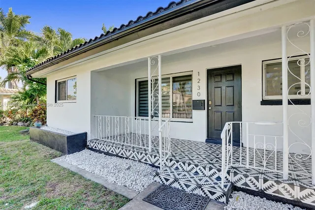 a very nice looking dining room with a table and chairs