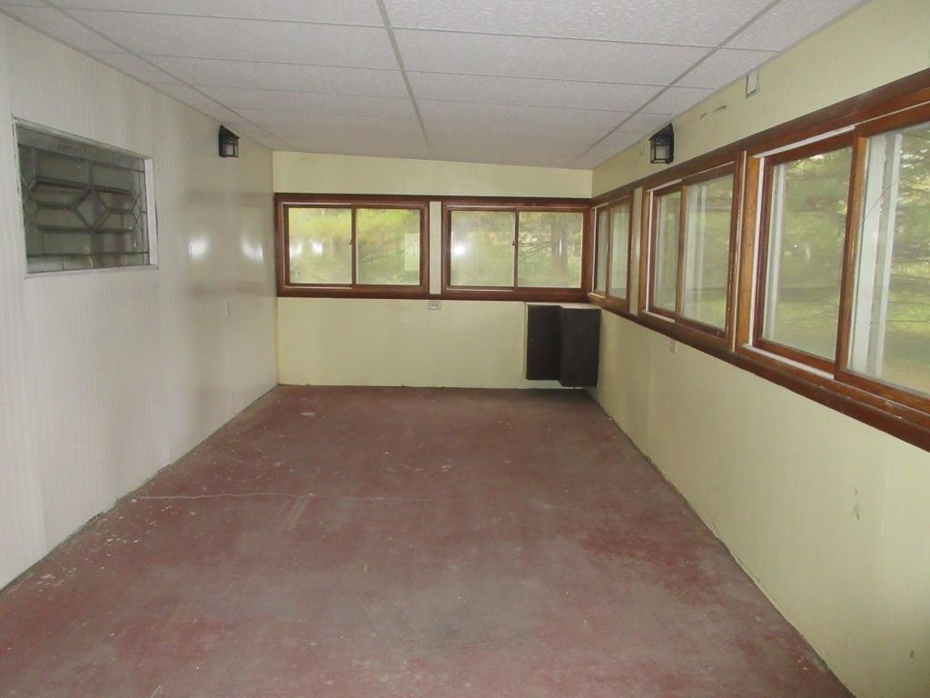303 Marengo Road Harvard, IL 60033 - Photo 11 of 13 a view of an empty room with a window