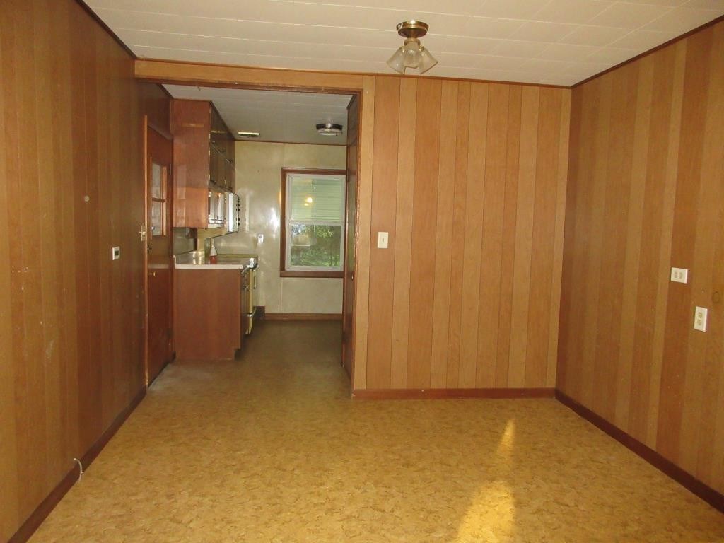 303 Marengo Road Harvard, IL 60033 - Photo 6 of 13 a view of a kitchen with a refrigerator