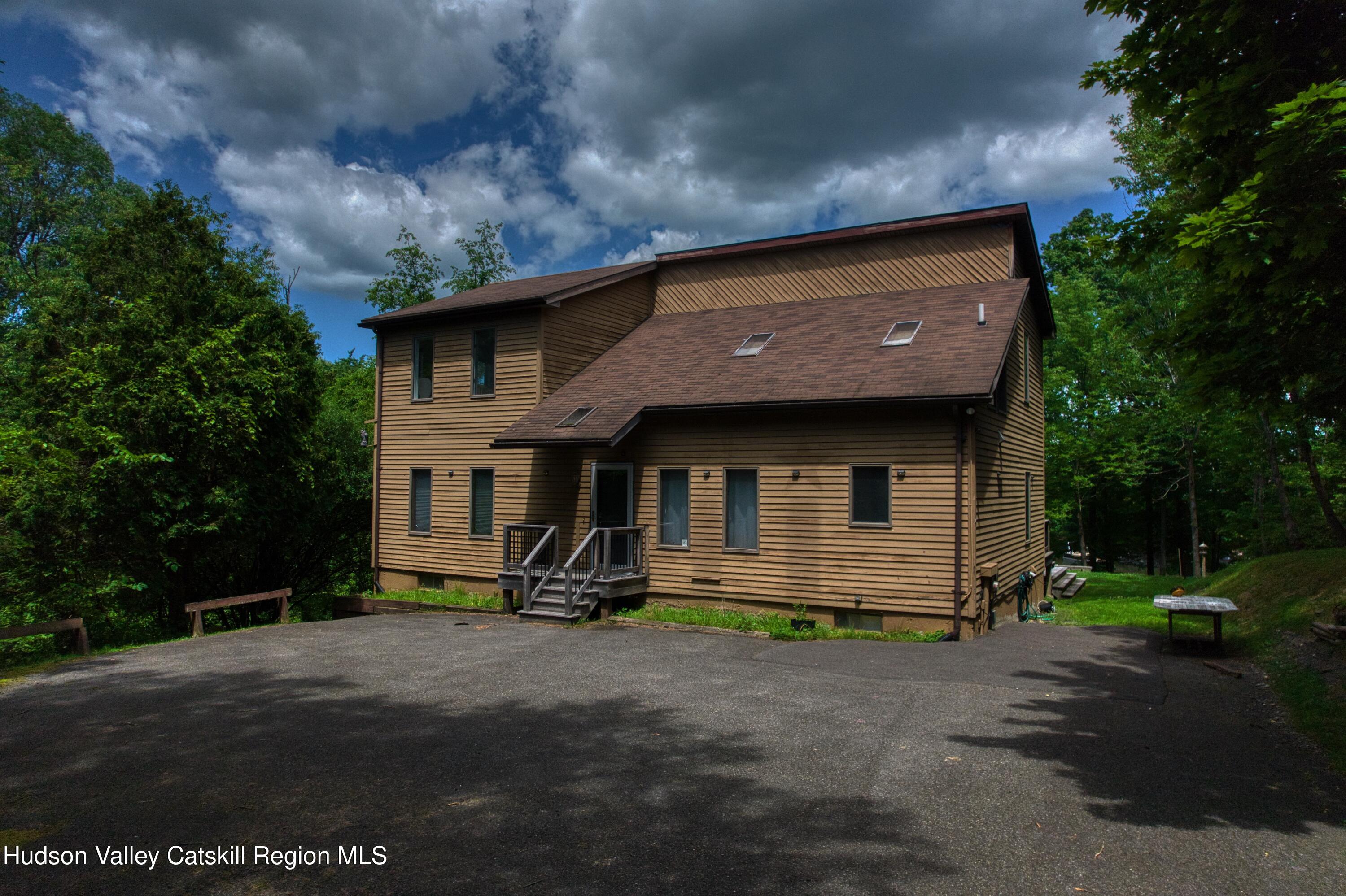 3223 Sleepy Hollow Road Athens, NY 12015 - Photo 50 of 55 a front view of a house with a yard
