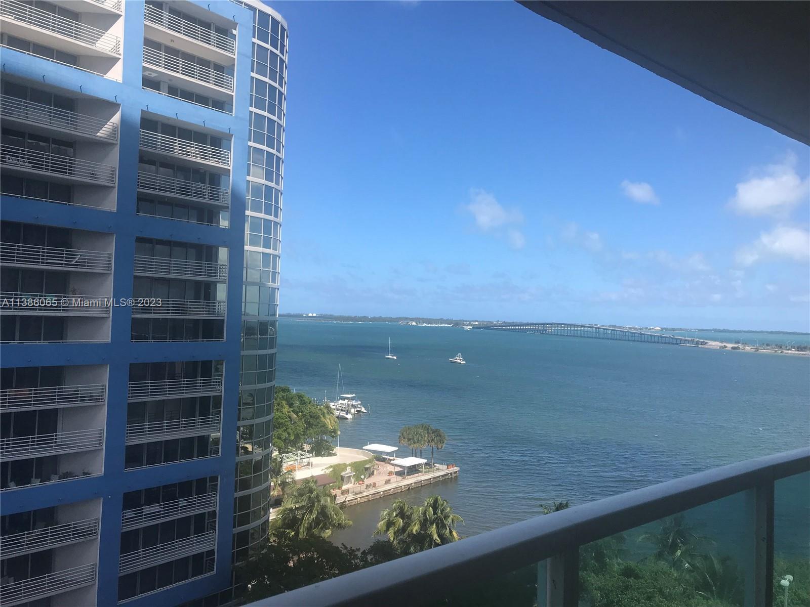 2101 Brickell Avenue, Unit 704 Miami, FL 33129 - Photo 10 of 32 a view of a lake from a balcony