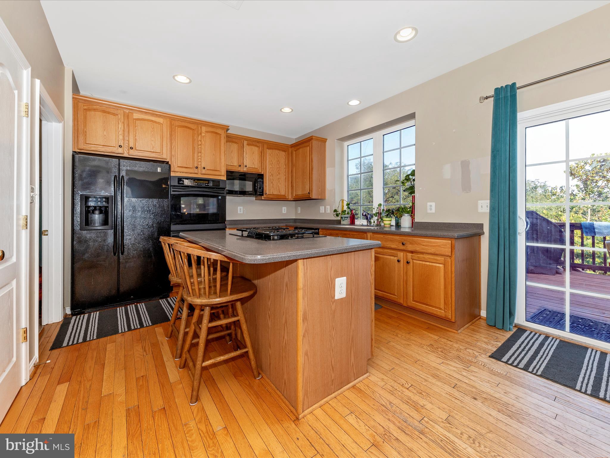 4 Jeffrey Lane Brunswick, MD 21758 - Photo 11 of 39 a kitchen with stainless steel appliances granite countertop a sink a stove and a refrigerator