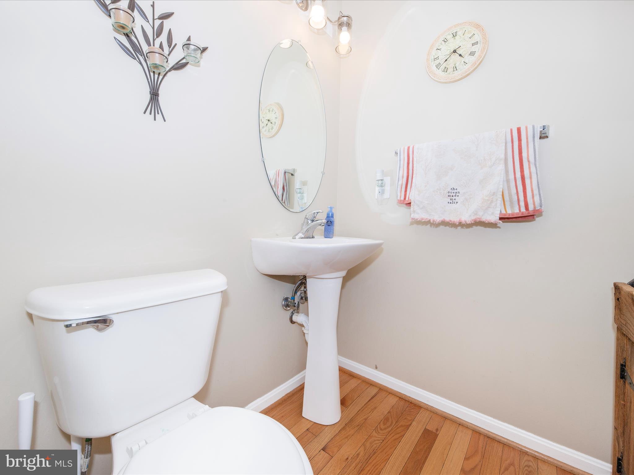 4 Jeffrey Lane Brunswick, MD 21758 - Photo 16 of 39 a bathroom with a toilet sink and mirror