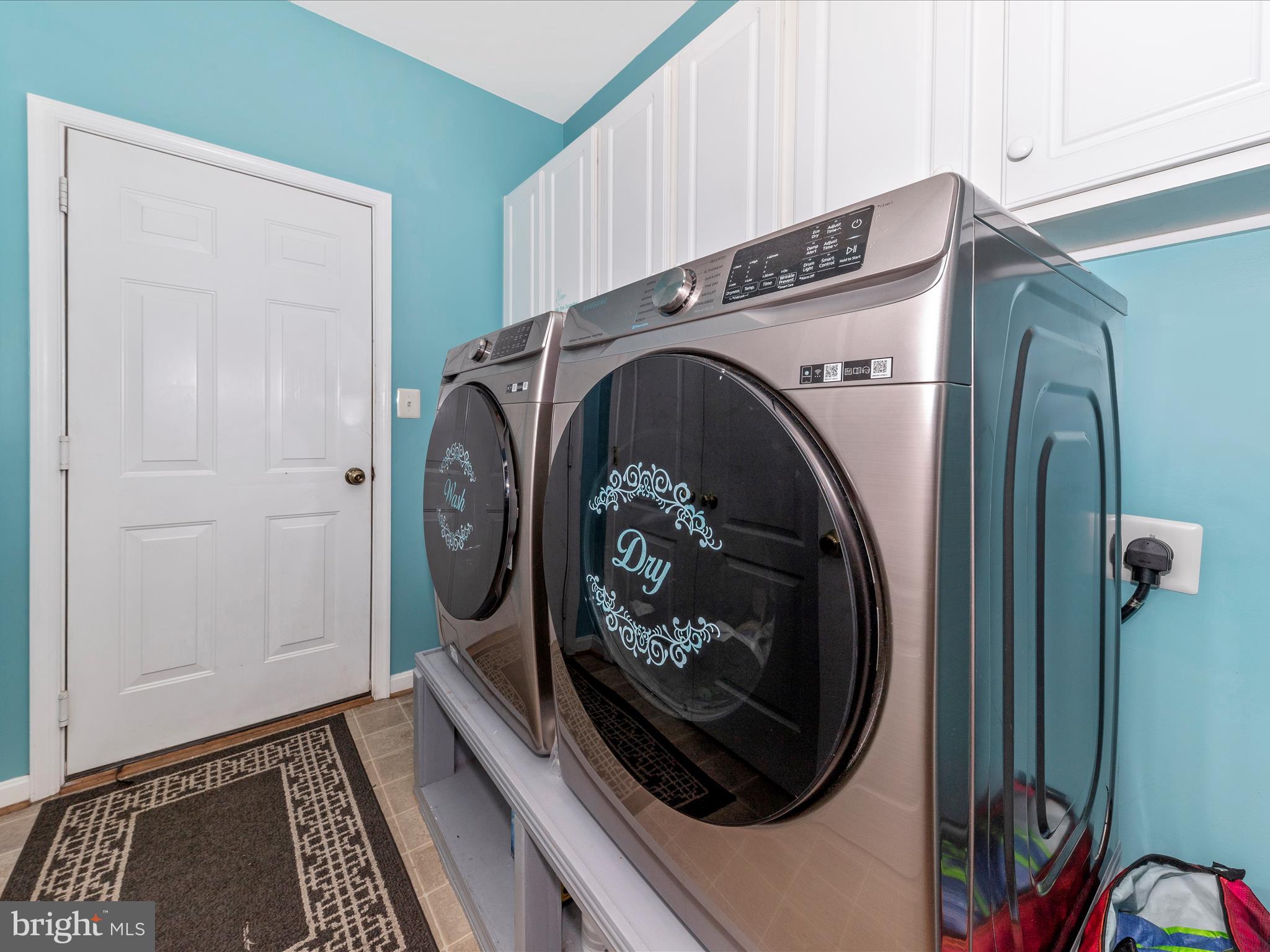4 Jeffrey Lane Brunswick, MD 21758 - Photo 17 of 39 a utility room with dryer and washer