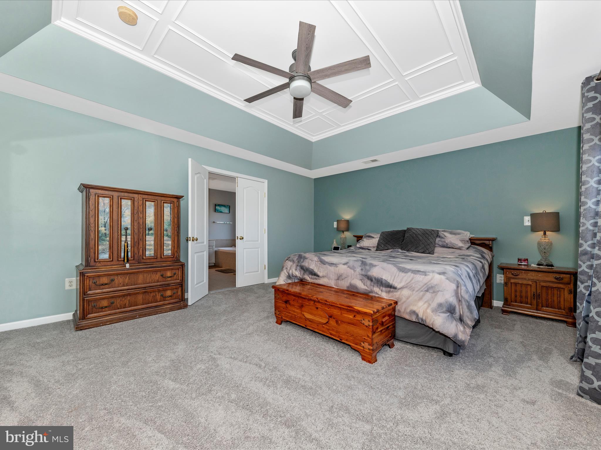 4 Jeffrey Lane Brunswick, MD 21758 - Photo 20 of 39 a spacious bedroom with a bed and a ceiling fan