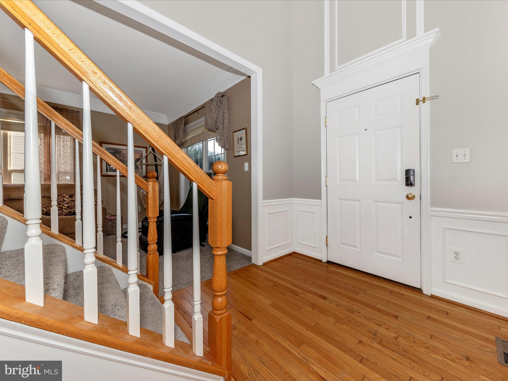 4 Jeffrey Lane Brunswick, MD 21758 - Photo 2 of 39 a view of an entryway with wooden floor and door