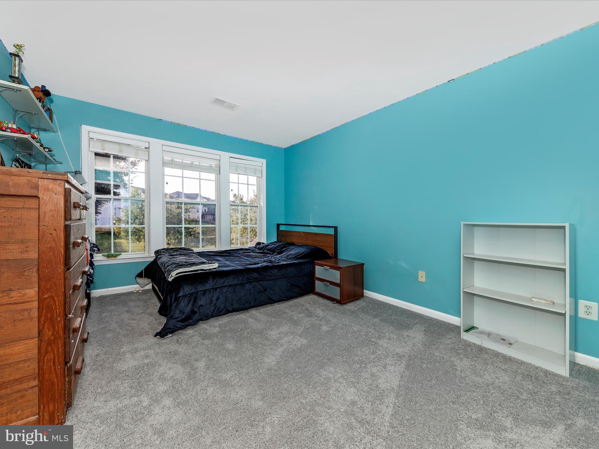 4 Jeffrey Lane Brunswick, MD 21758 - Photo 26 of 39 a bedroom with a bed and a window