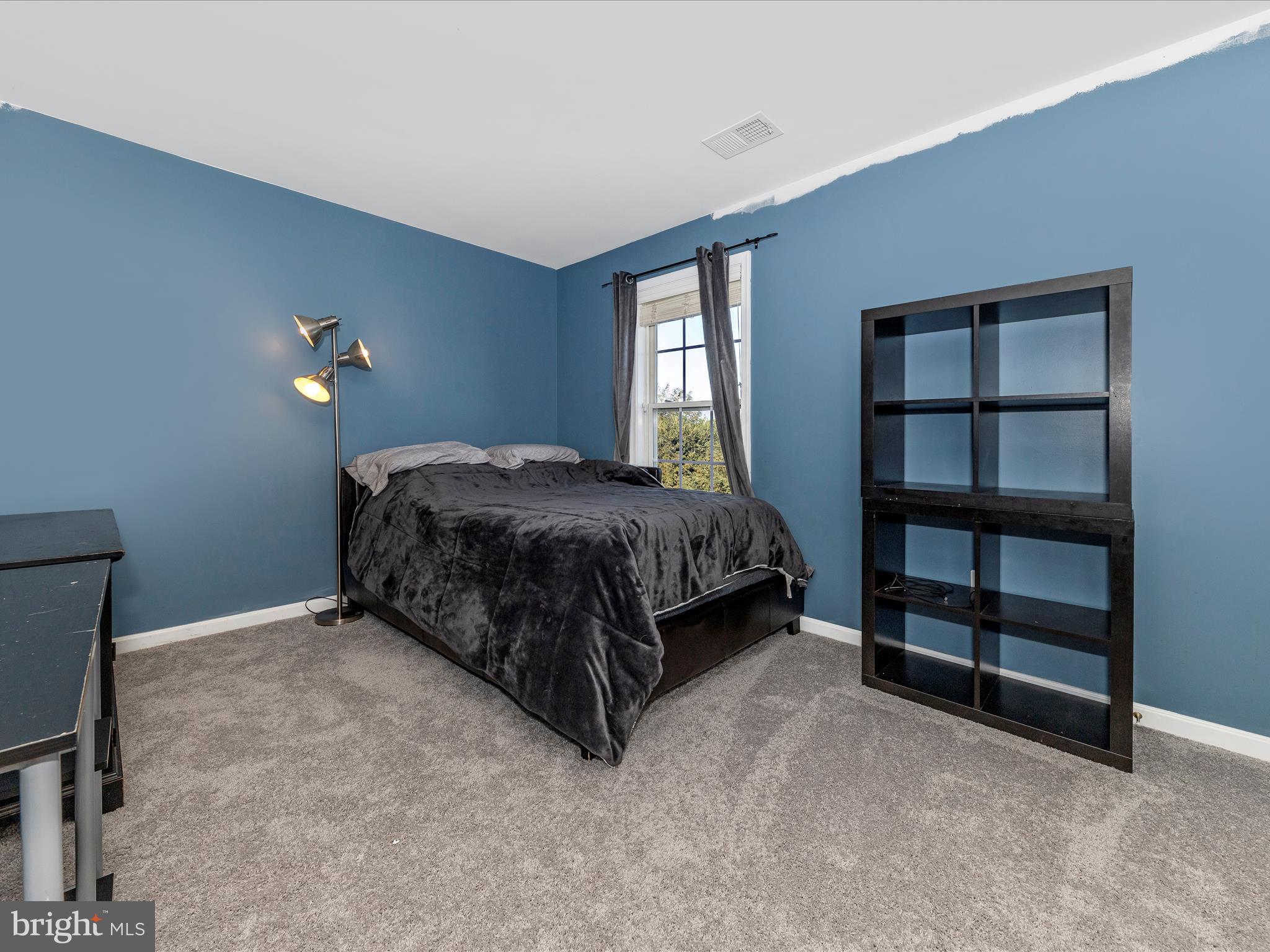 4 Jeffrey Lane Brunswick, MD 21758 - Photo 27 of 39 a bedroom with a bed and a window