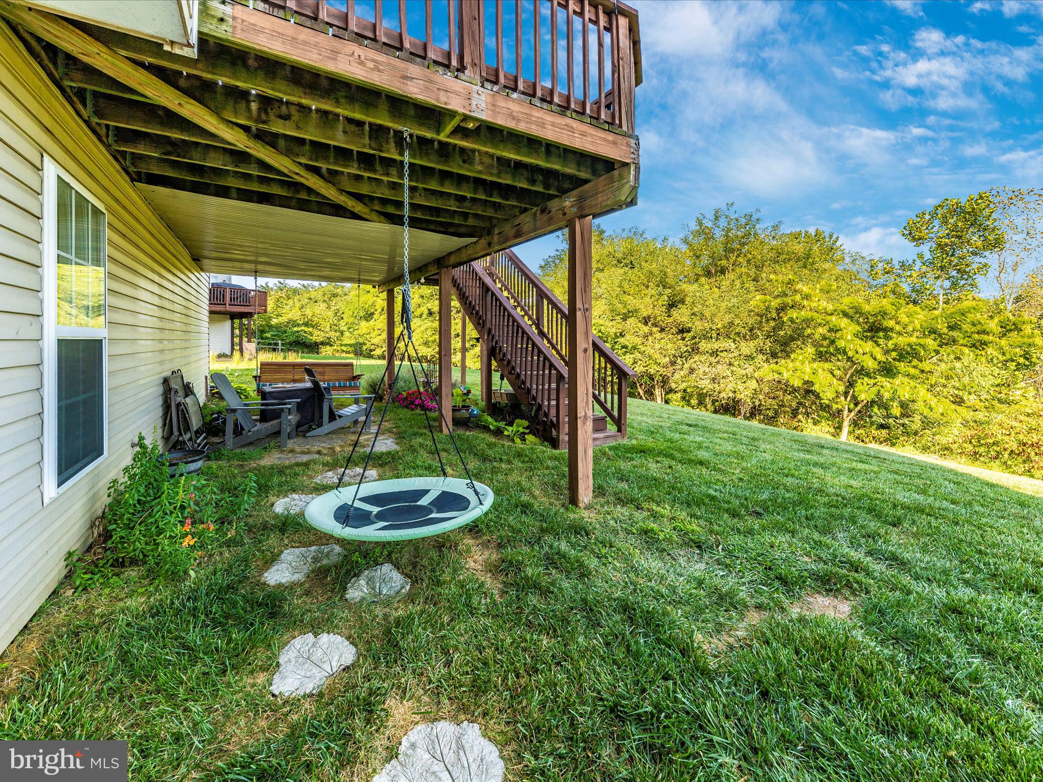 4 Jeffrey Lane Brunswick, MD 21758 - Photo 38 of 39 a patio with table and chairs and potted plants