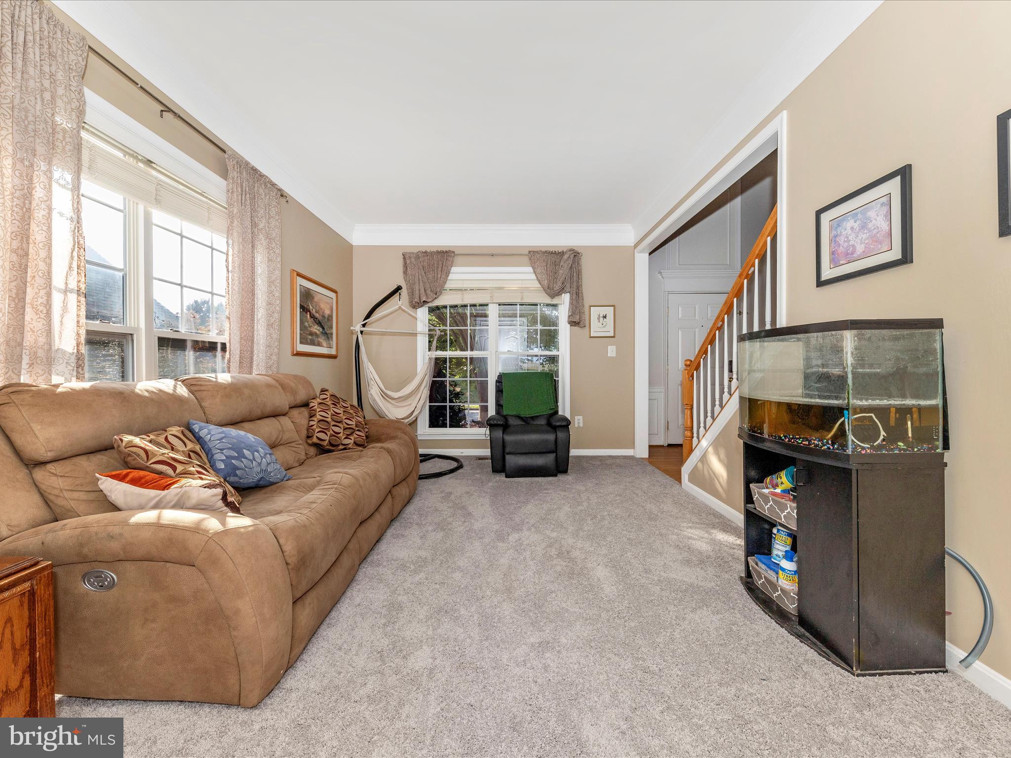 4 Jeffrey Lane Brunswick, MD 21758 - Photo 5 of 39 a living room with furniture and a fireplace