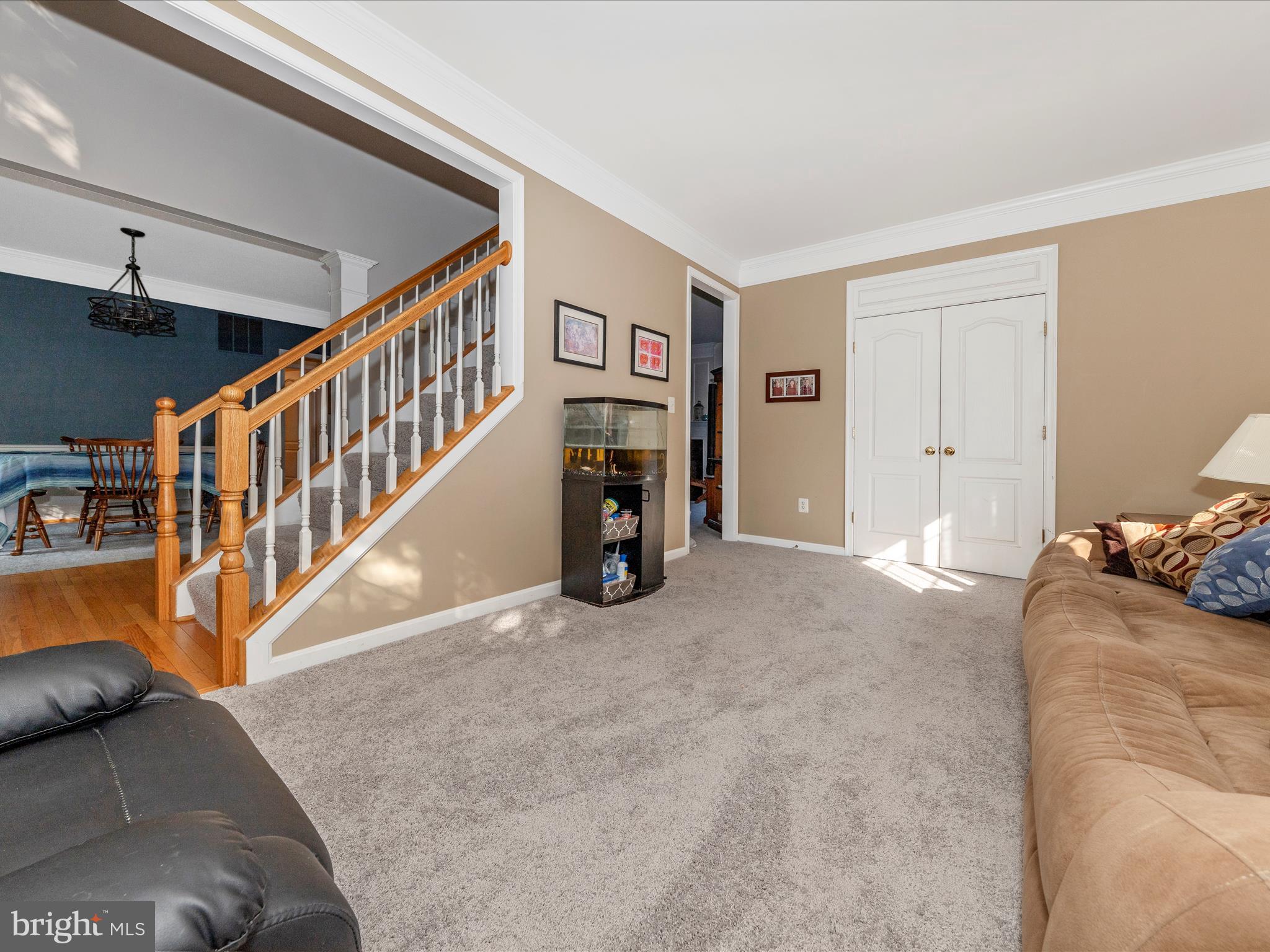 4 Jeffrey Lane Brunswick, MD 21758 - Photo 7 of 39 a view of a livingroom with furniture and staircase
