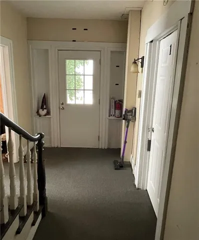 a bedroom with a bed and furniture