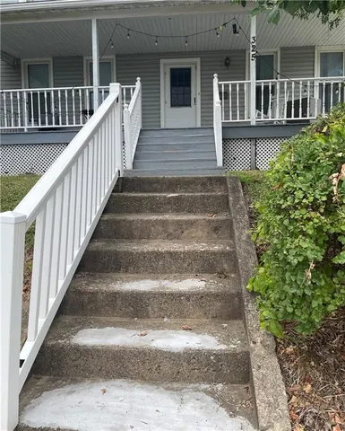 a view of entryway with a front door