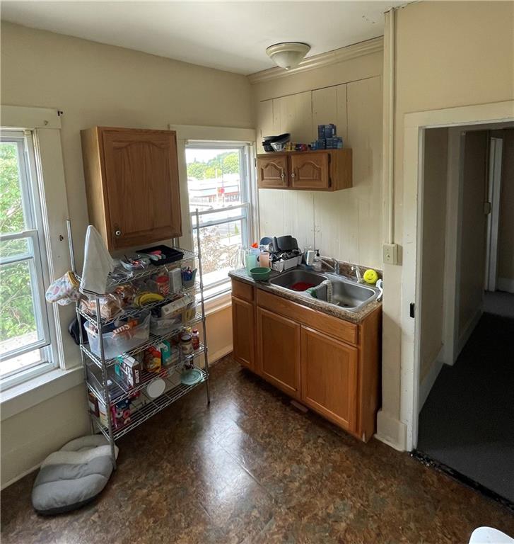 325 South Main Street Slippery Rock, PA 16057 - Photo 35 of 39 a kitchen that has a lot of cabinets a stove and a window