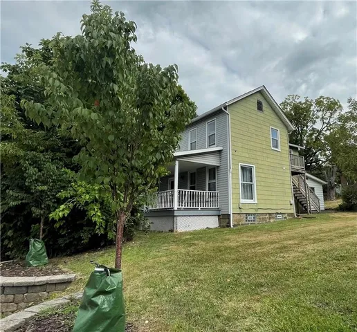 a house view with a outdoor space