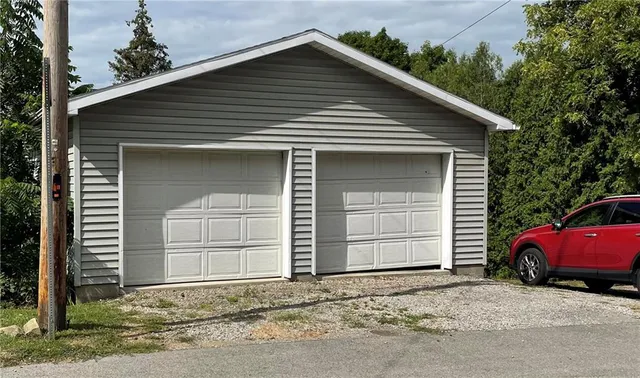 a view of a room with stairs and a large window