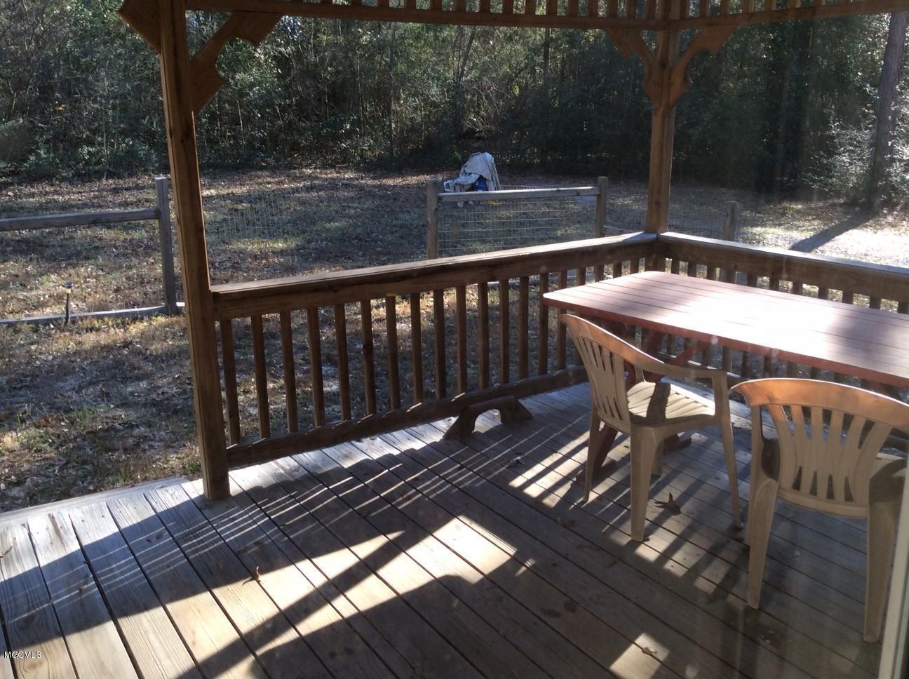 76 Elmer Smith Road Lumberton, MS 39455 - Photo 4 of 20 FRONT DECK/PORCH