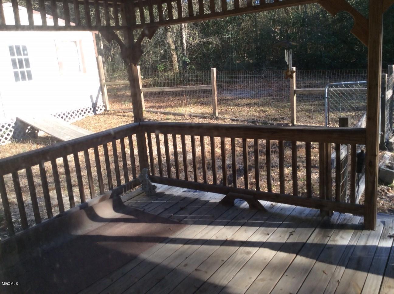 76 Elmer Smith Road Lumberton, MS 39455 - Photo 5 of 20 FRONT DECK/PORCH