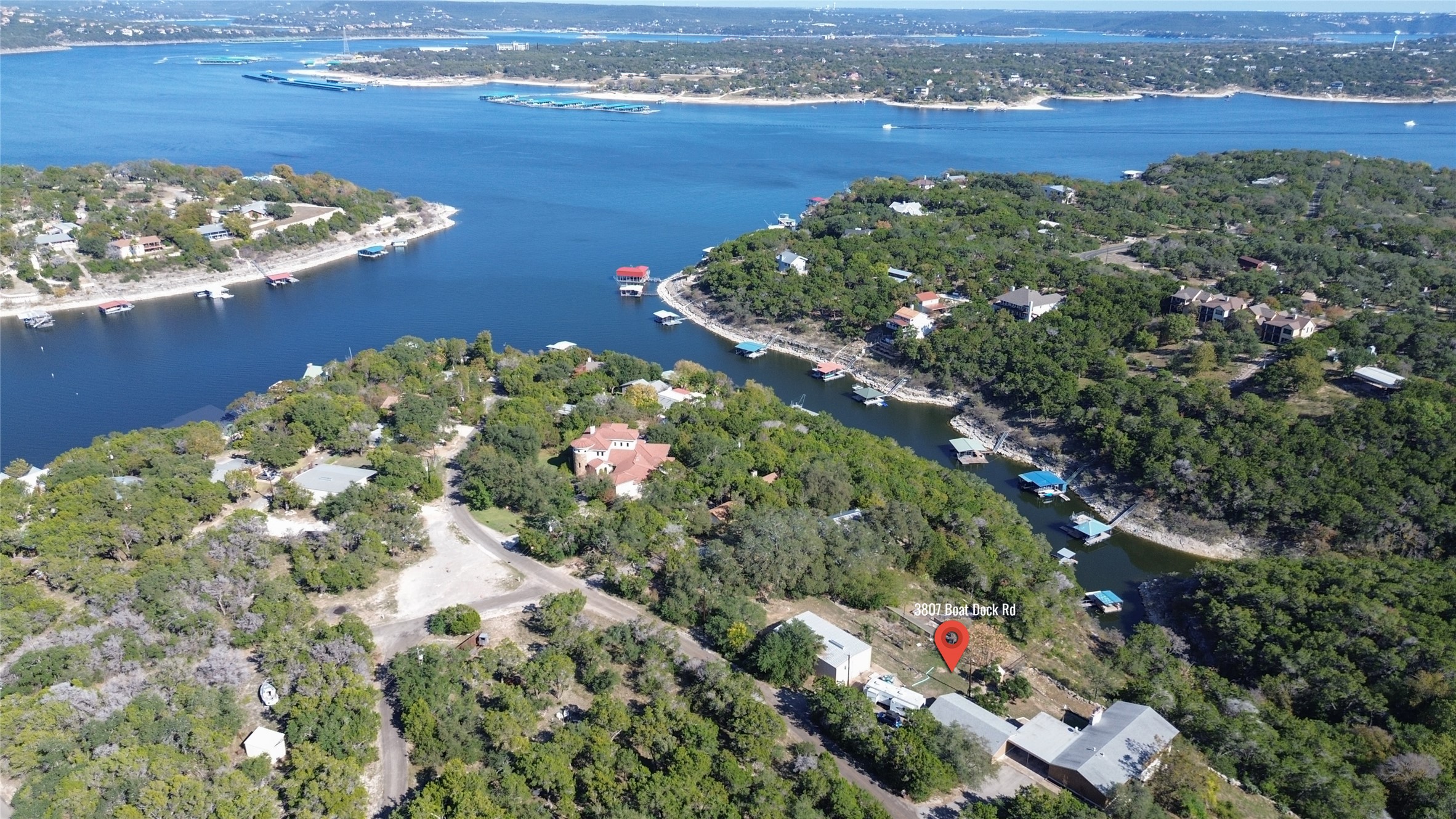 3807 Boat Dock Road Lago Vista, TX 78645 - Photo 29 of 37 Discover expansive lake views and verdant surroundings at this remarkable waterfront property.