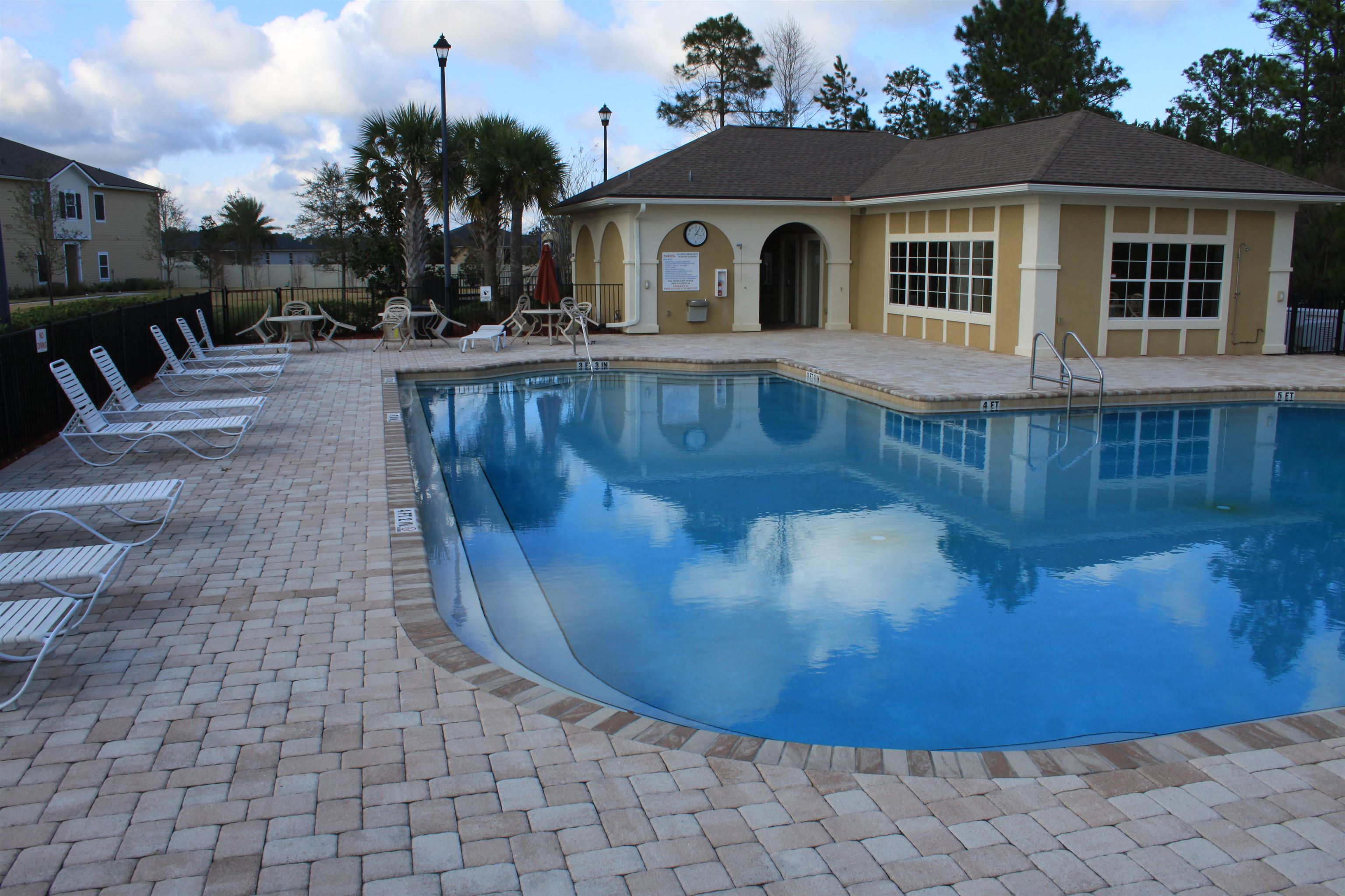 811 Golden Lake Loop St. Augustine, FL 32084 - Photo 15 of 20 a view of a house with a yard