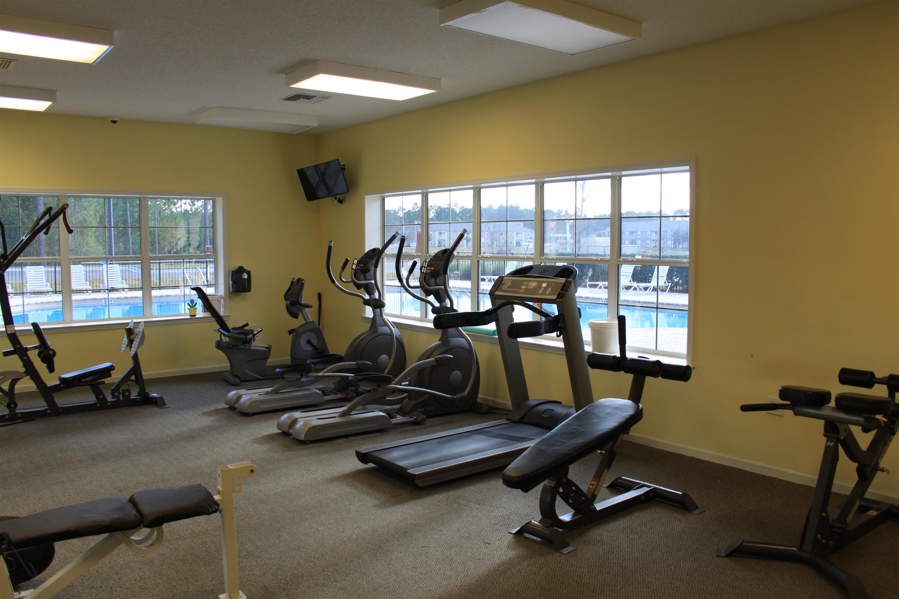 811 Golden Lake Loop St. Augustine, FL 32084 - Photo 18 of 20 a view of a room with gym equipment