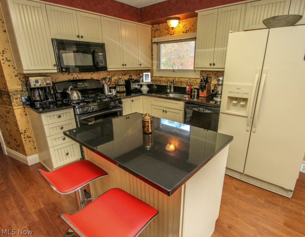 6411 Chestnut Road Independence, OH 44131 - Photo 6 of 25 Fully Applianced Kitchen with Island