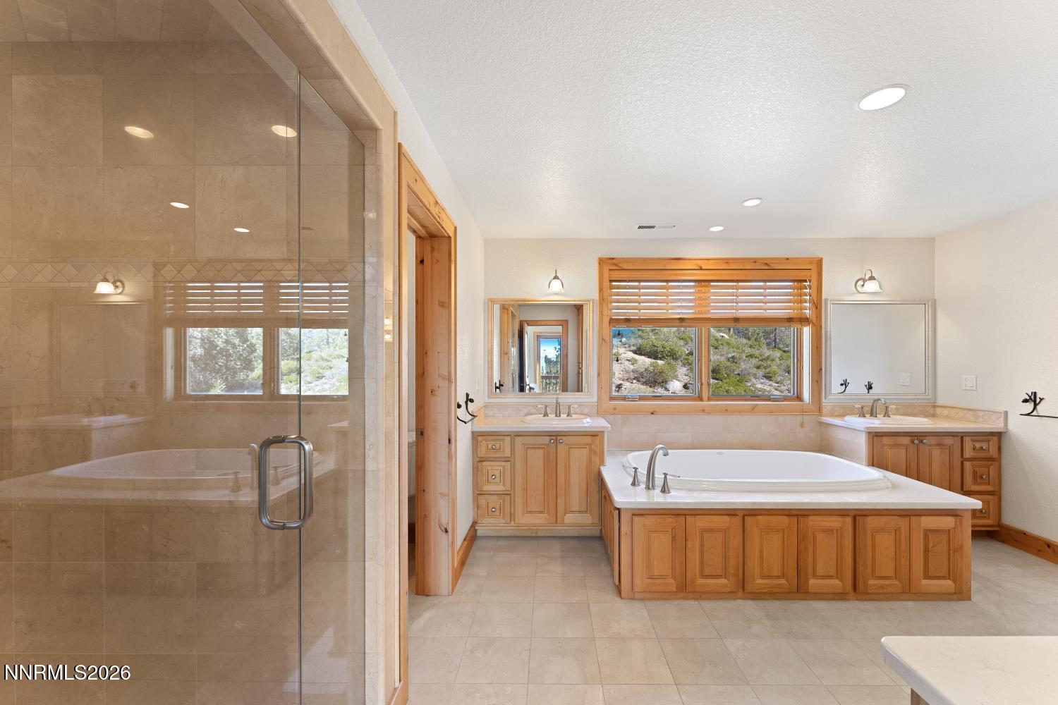38 South Point Place Glenbrook, NV 89413 - Photo 15 of 24 a large spacious bathroom with a large tub and shower