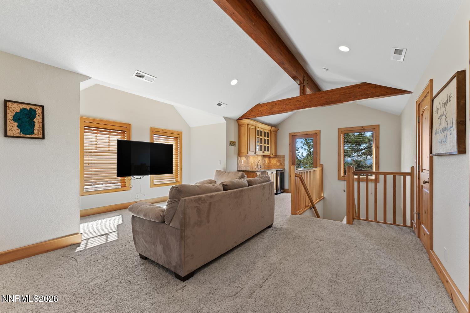 38 South Point Place Glenbrook, NV 89413 - Photo 16 of 24 a living room with furniture and a flat screen tv