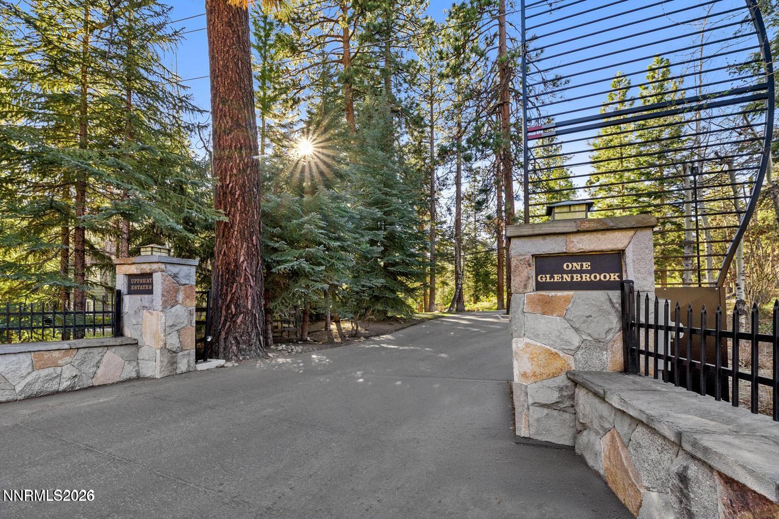 38 South Point Place Glenbrook, NV 89413 - Photo 18 of 24 a view of a brick house with a tree