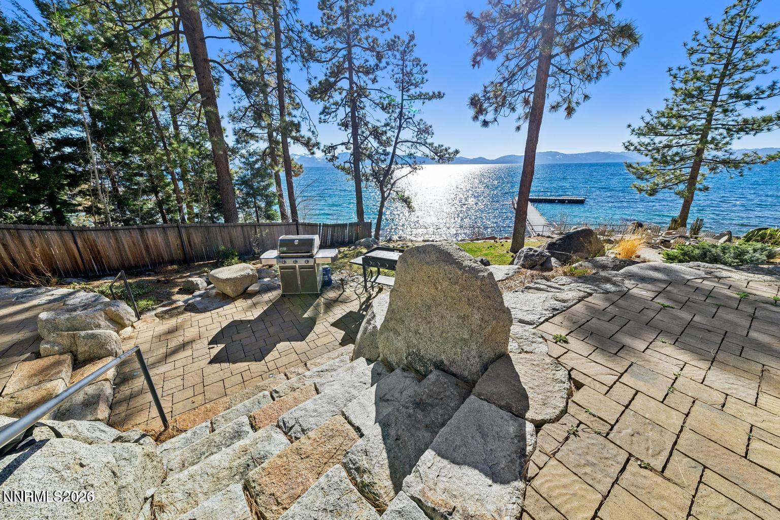 38 South Point Place Glenbrook, NV 89413 - Photo 22 of 24 a view of a backyard with sitting area