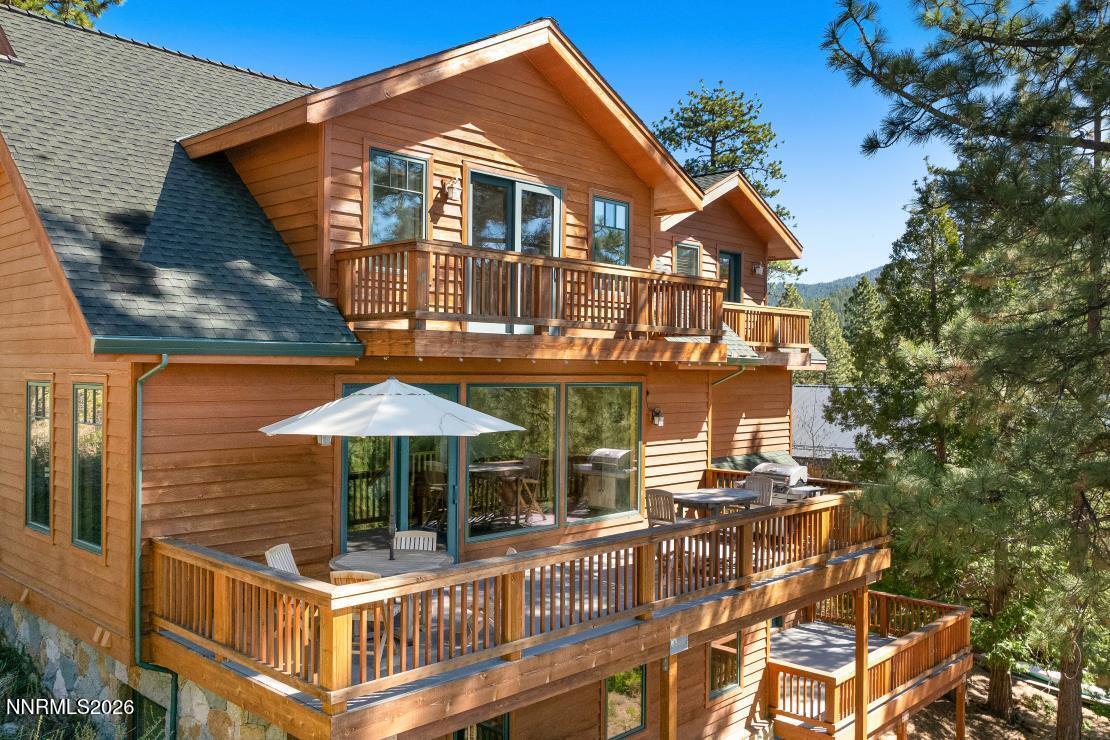 38 South Point Place Glenbrook, NV 89413 - Photo 3 of 24 a front view of a house with a yard