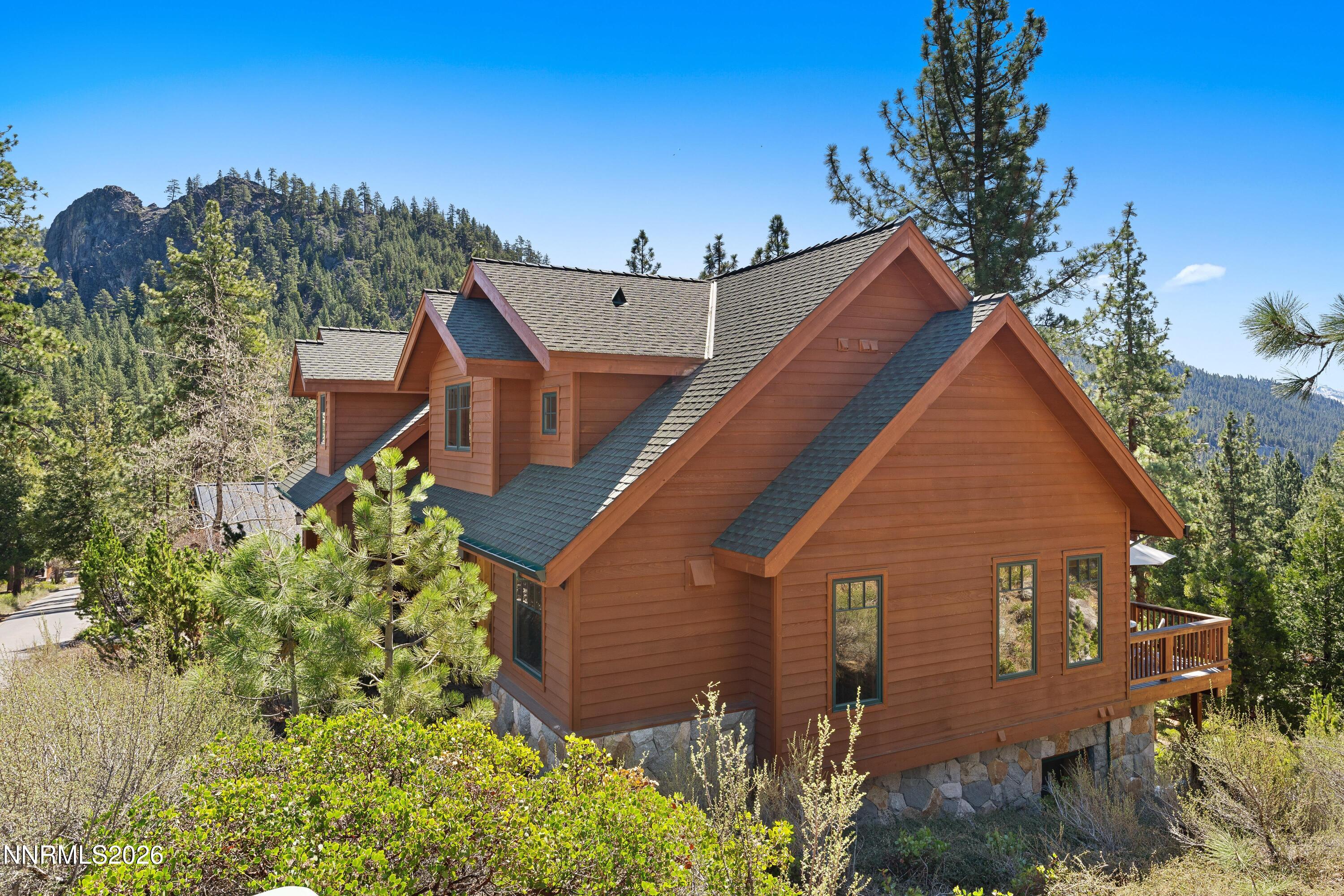 38 South Point Place Glenbrook, NV 89413 - Photo 6 of 24 a view of a house with a yard and plants