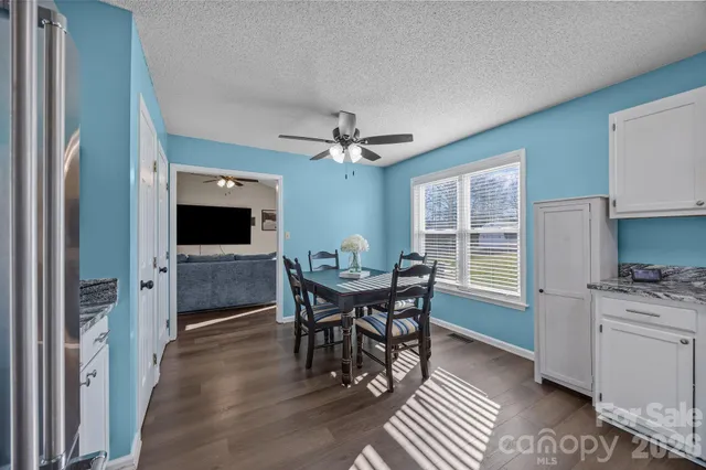 a view of a dining room with furniture