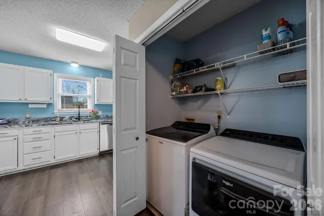 a bathroom with a sink vanity and a mirror