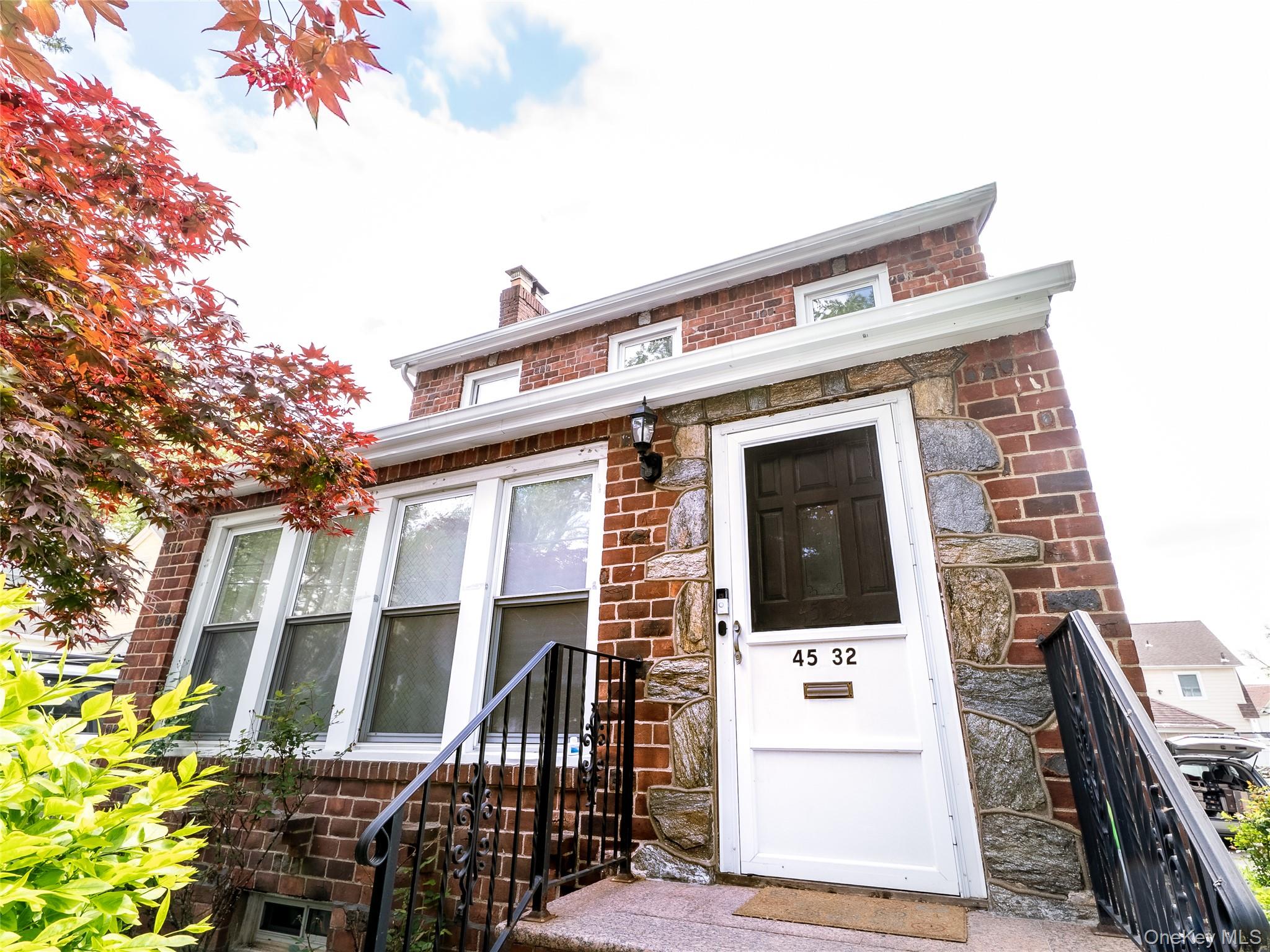 a view of a house with large windows