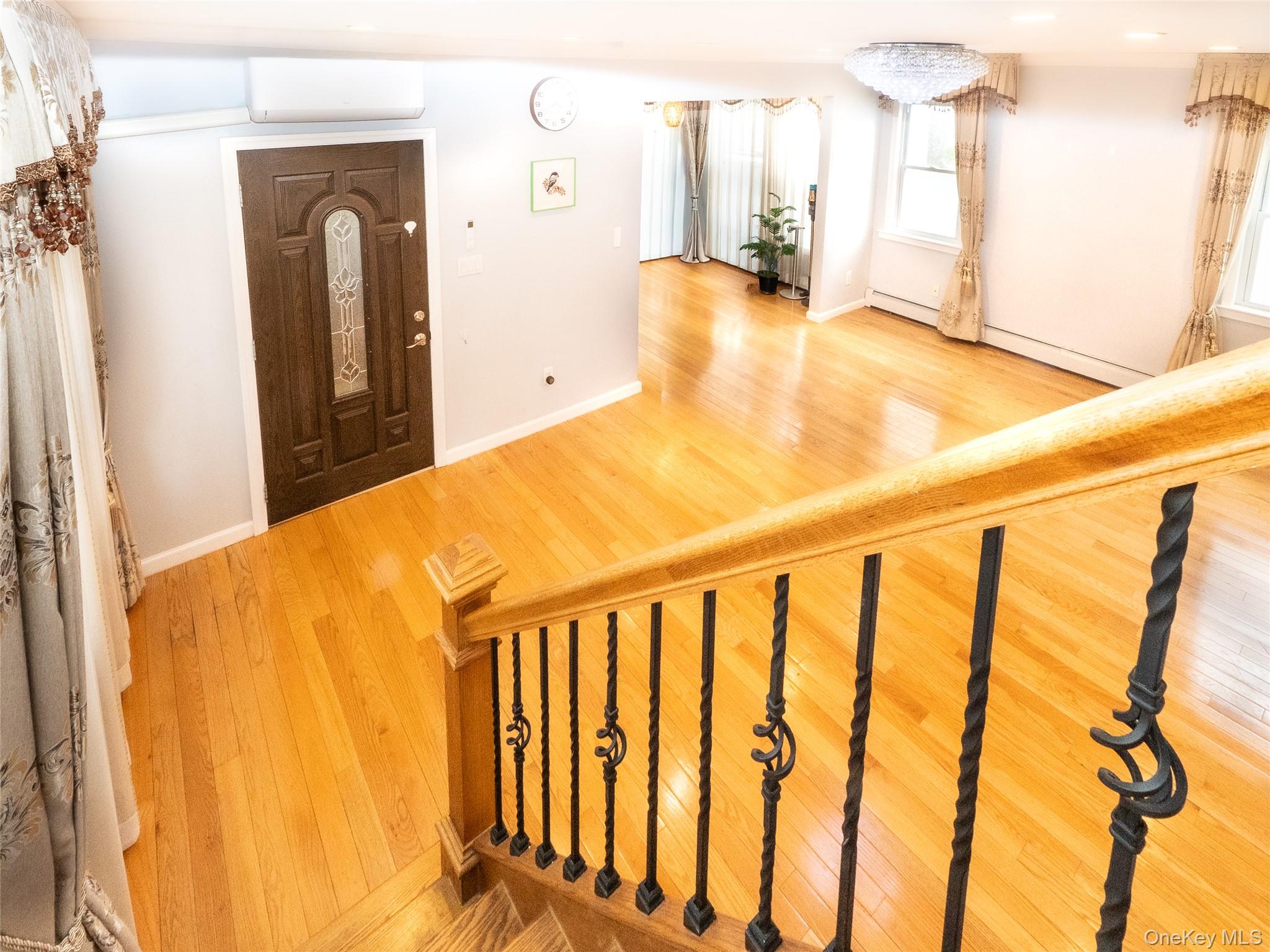 45-32 Westminster Road Great Neck, NY 11020 - Photo 11 of 21 a view of a room with wooden floor