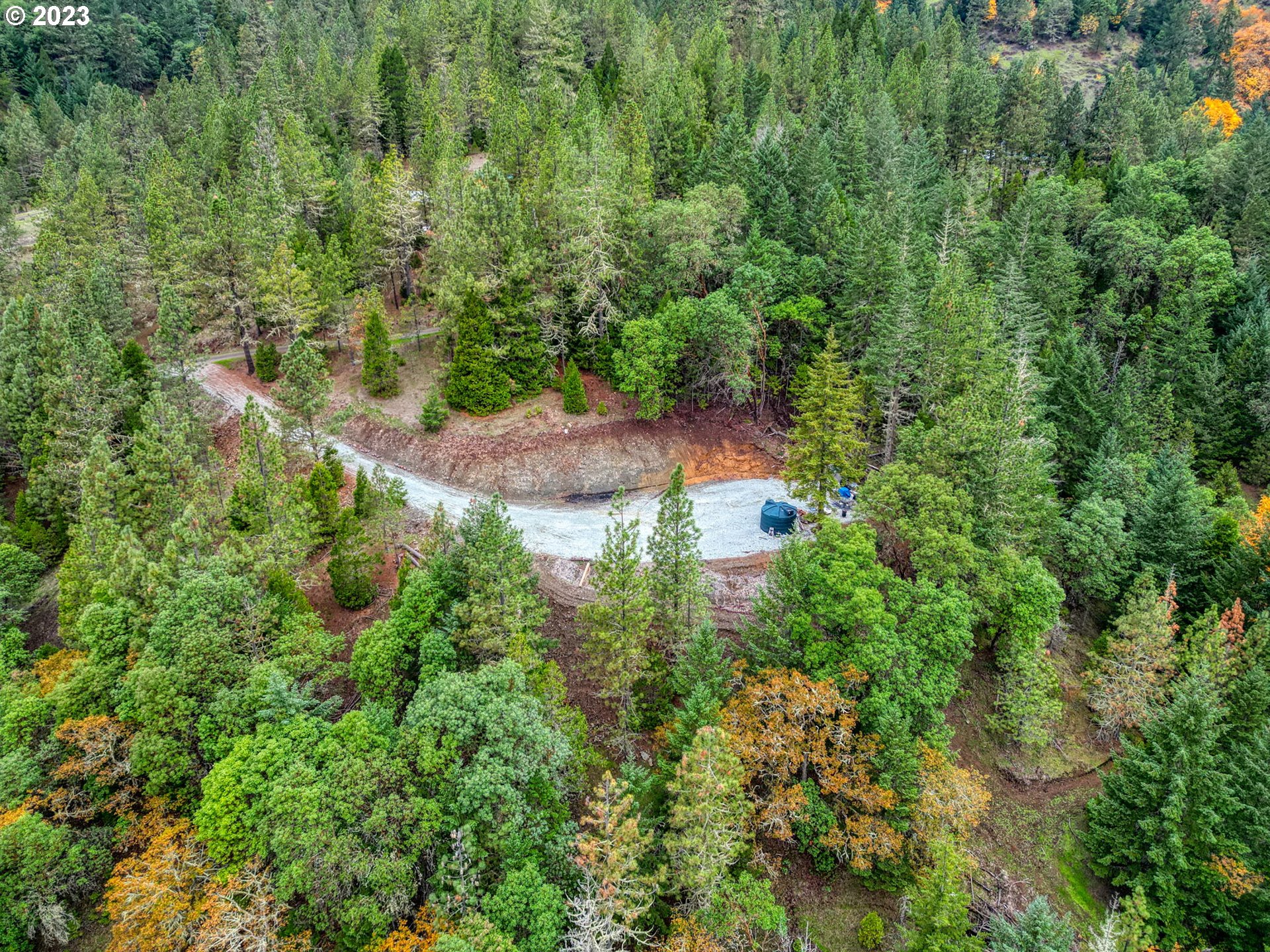 2129 Spring Brook Road Myrtle Creek, OR 97457 - Photo 4 of 28 an aerial view of residential house with outdoor space and trees all around