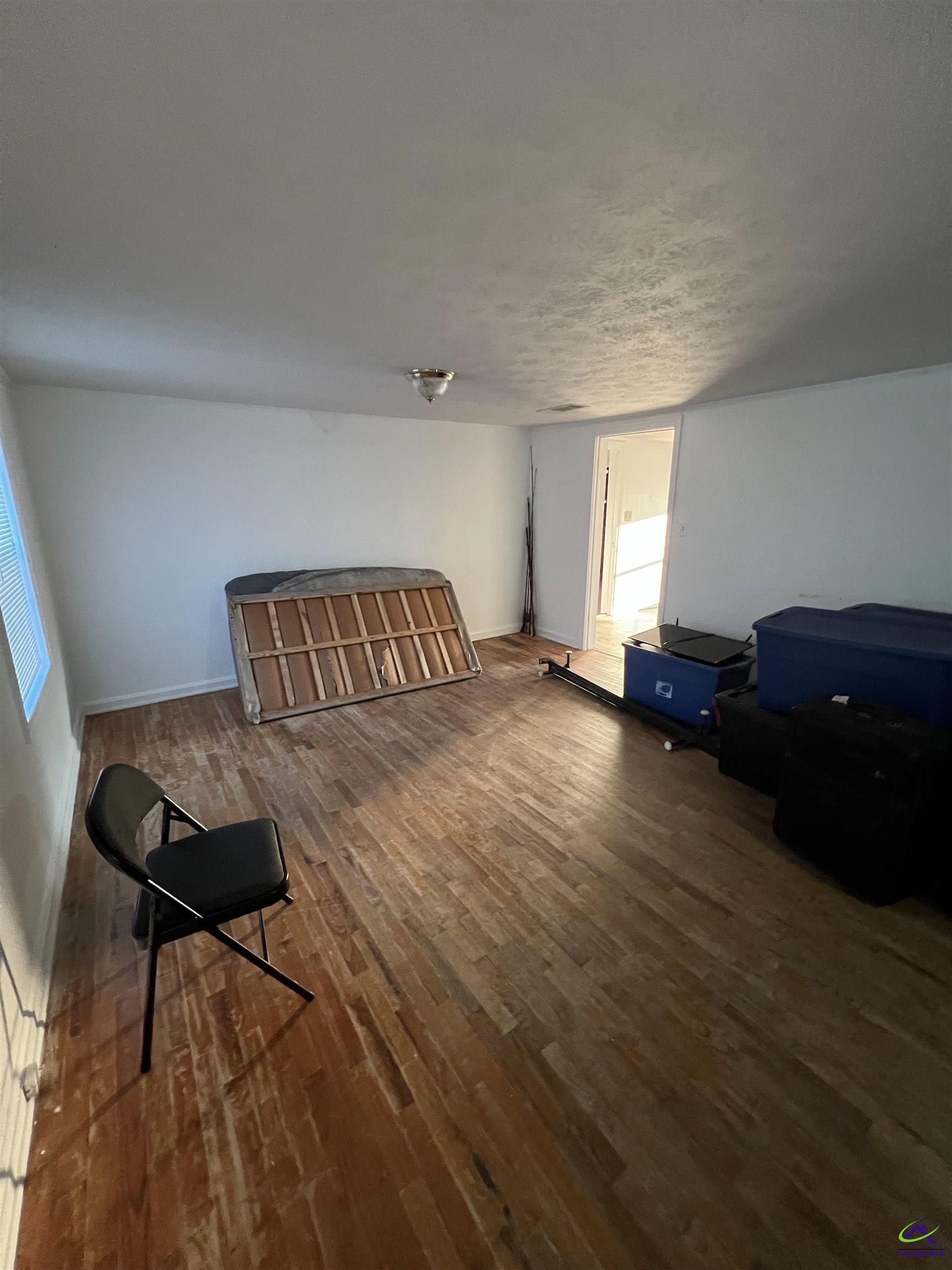 3281 State Rte 126 Dublin, GA 31021 - Photo 10 of 22 a bedroom with a bed and a dresser
